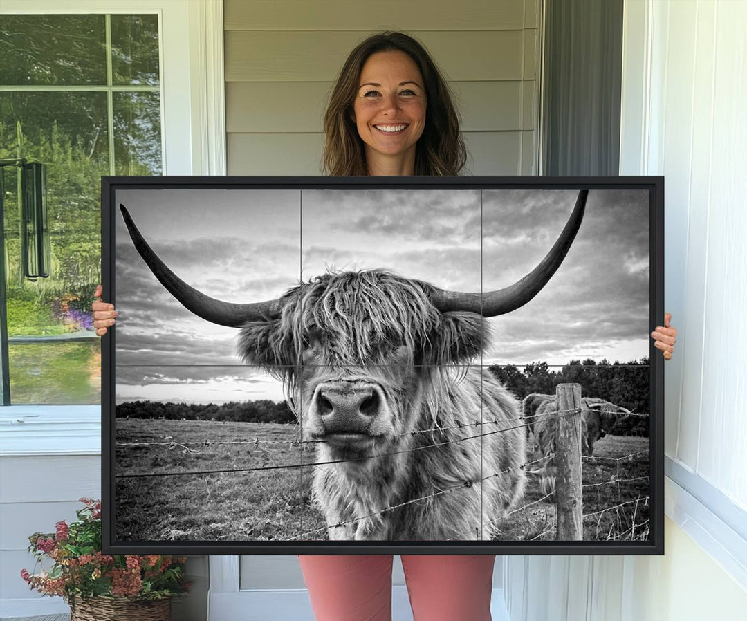 The Scottish Highland Cow Wall Art Canvas Print is ready to hang and framed, adding rustic farmhouse decor to your wall.