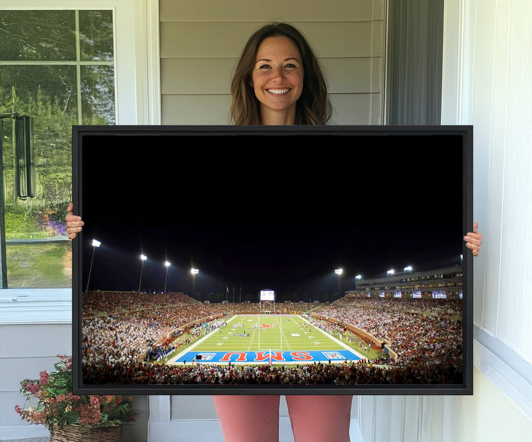 Wide-angle view of a vibrant painting depicting SMU Mustangs Football at Dallas Gerald J. Ford Stadium, capturing the energy and excitement of a filled stadium and brightly lit field.