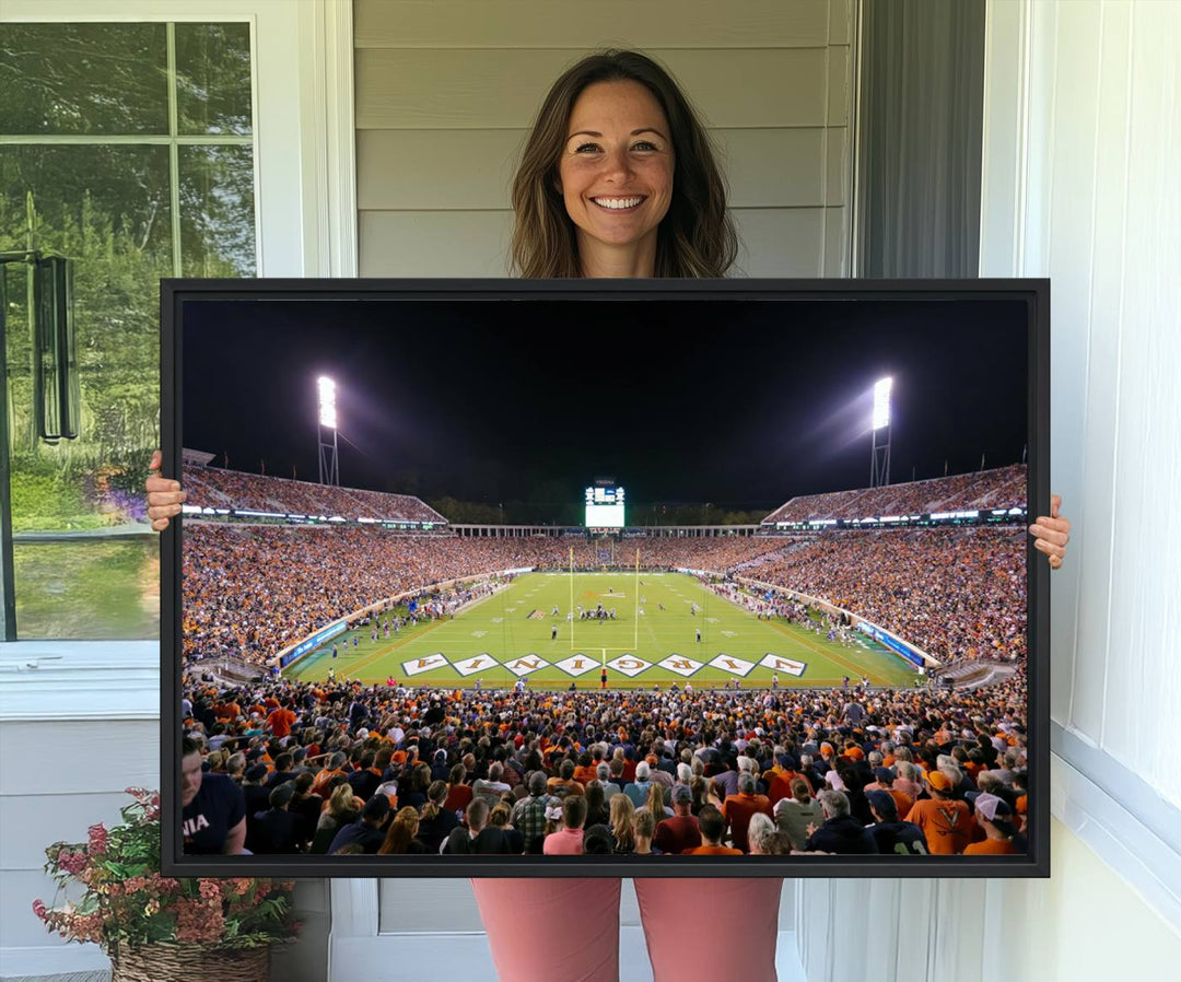 A Virginia Cavaliers Wall Art Canvas Print captures Scott Stadium filled with fans under the night sky.