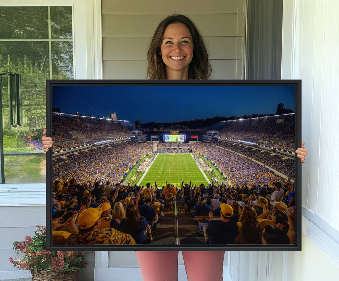 A Pittsburgh Panthers Acrisure Stadium canvas print captures the thrill of a packed stadium under lights and fans cheering.