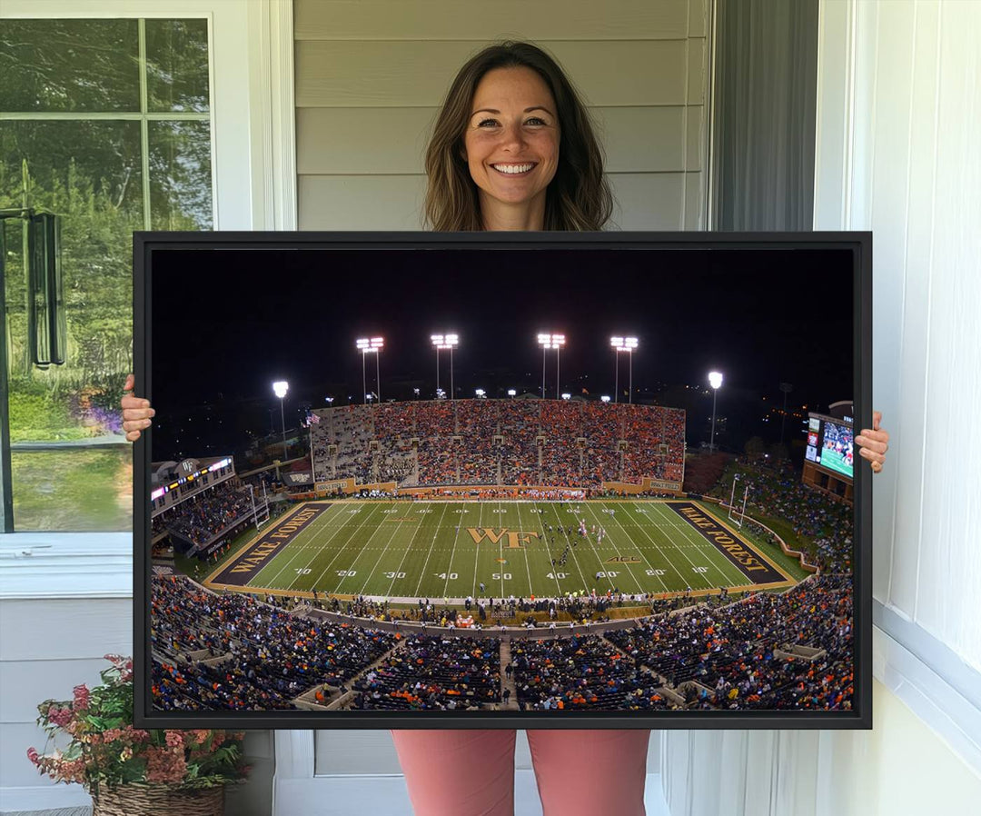 The Demon Deacons stadium print captures a brightly lit, bustling scene on museum-quality canvas.