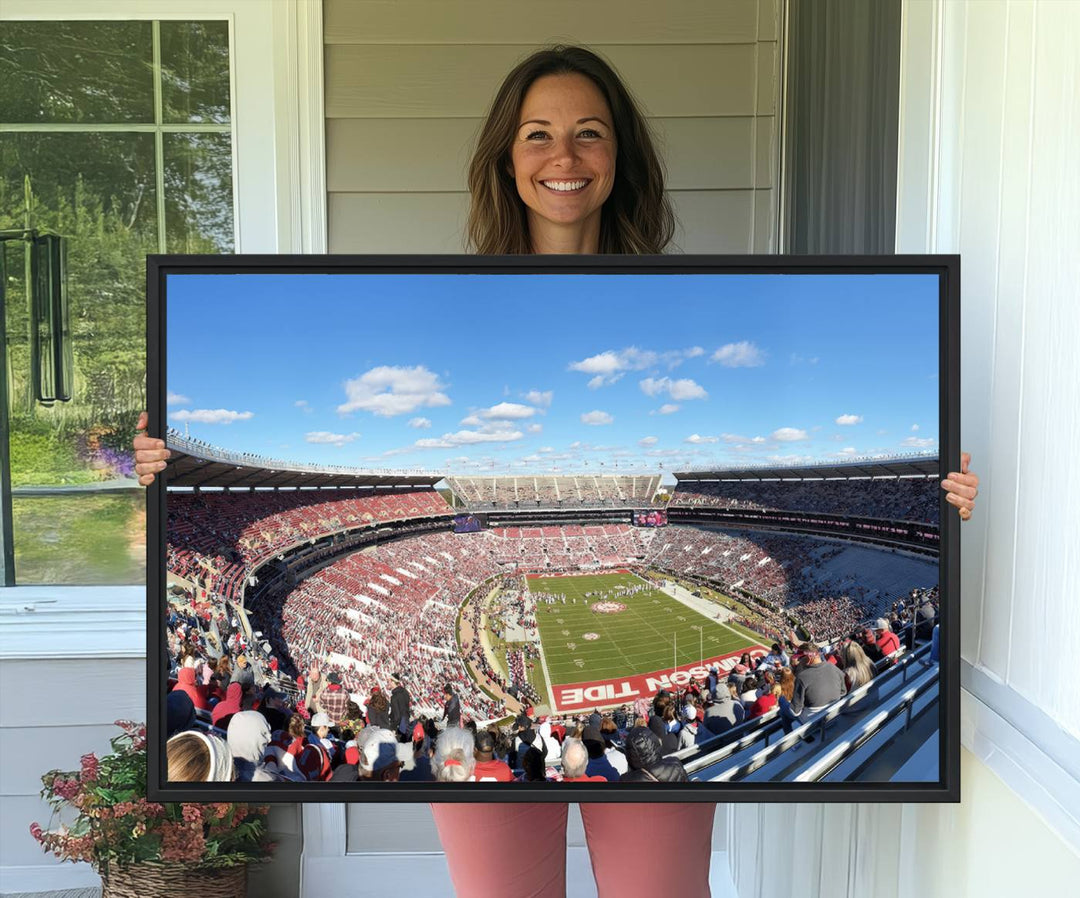 Canvas print of Alabama Crimson Tides Bryant-Denny Stadium, showcasing a sunlit field under a blue sky.