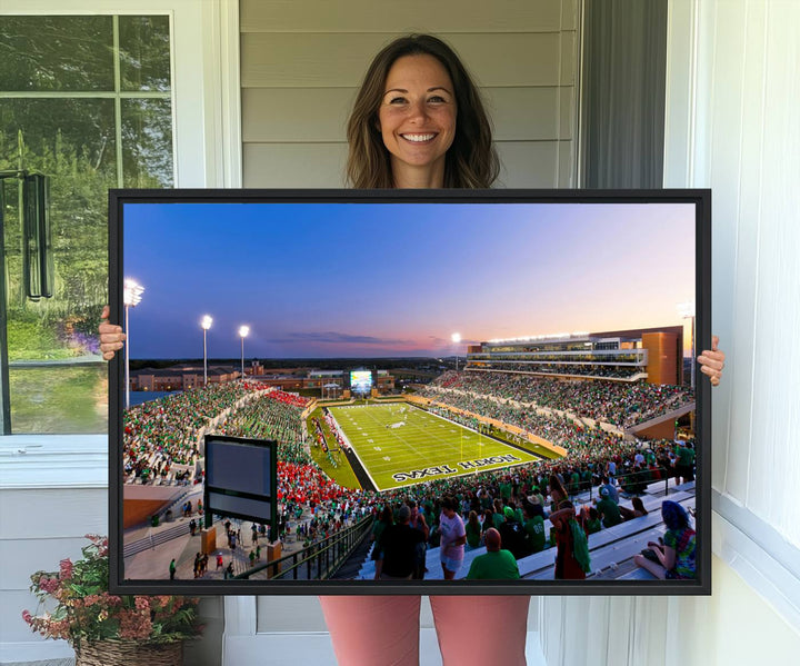 The canvas features Denton DATCU Stadium, OZEKI FIELD, illuminated under the lights and vibrant with fans supporting the University of North Texas.