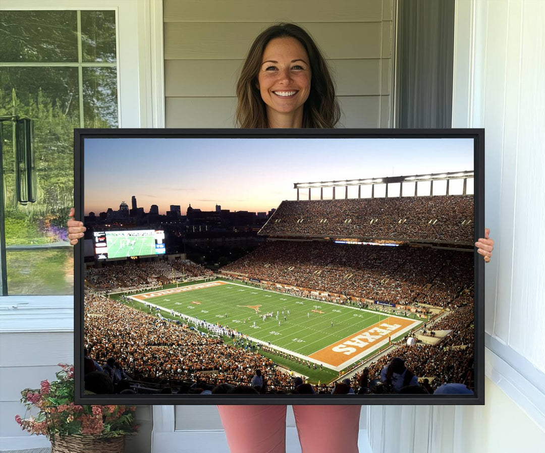 The Evening Game canvas art captures a glowing sunset and skyline at Texas Longhorns Darrell K Royal Stadium.