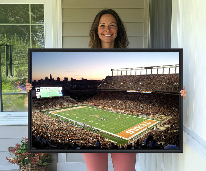 The Evening Game canvas art captures a glowing sunset and skyline at Texas Longhorns Darrell K Royal Stadium.