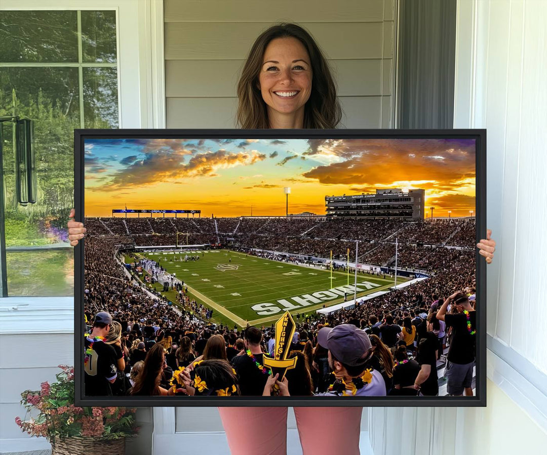 A sunset football game at UCFs Stadium—ideal as a premium wall art canvas print for your home.