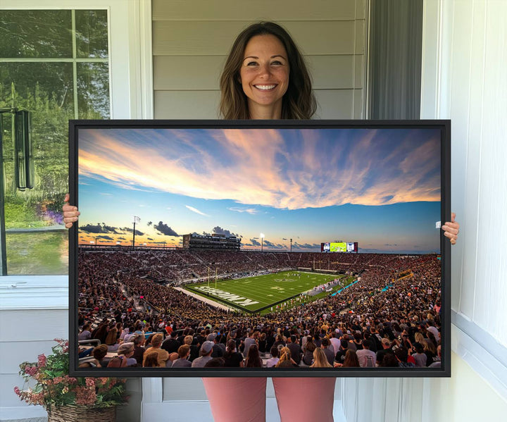 A vibrant wall art canvas captures a sunset scene at Orlandos FBC Mortgage Stadium, featuring the UCF Knights.