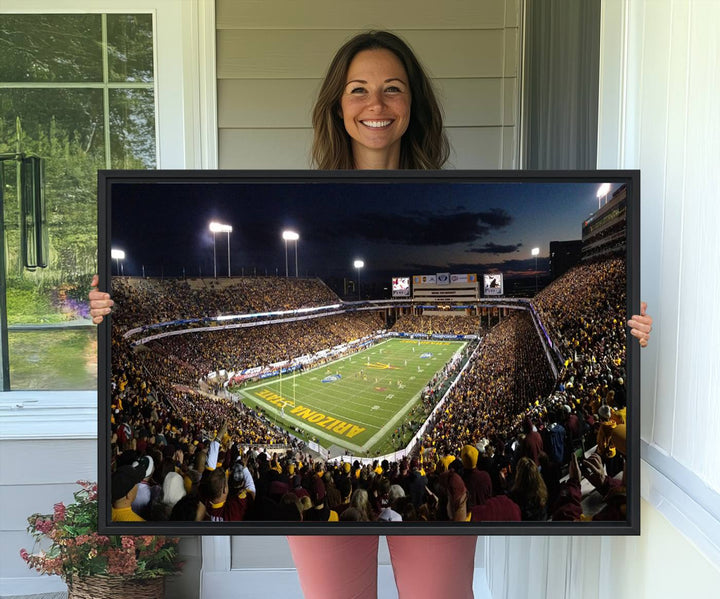 A room featuring an ASU Sun Devils Football Team Print, capturing fans at Phoenix Mountain America Stadium at dusk.