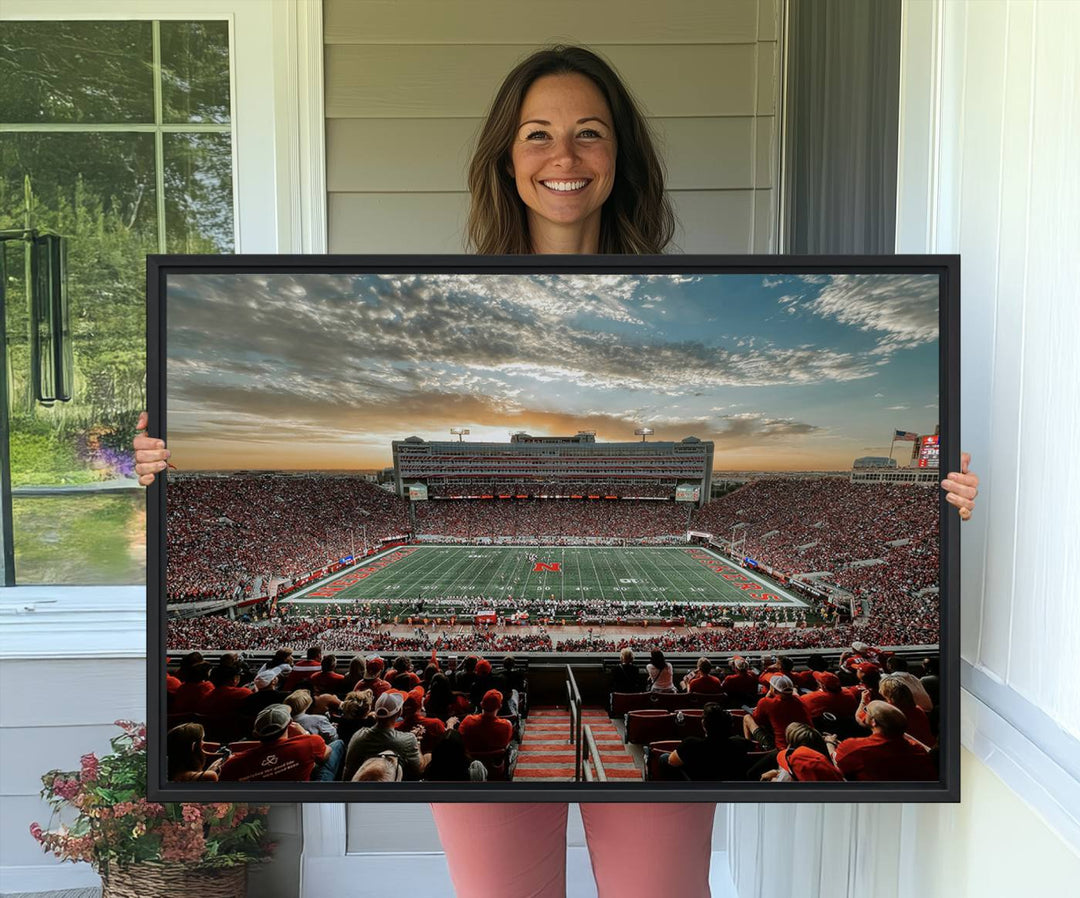 This stunning canvas wall art print features a packed Lincoln Memorial Stadium with the University of Nebraska Cornhuskers at sunset.