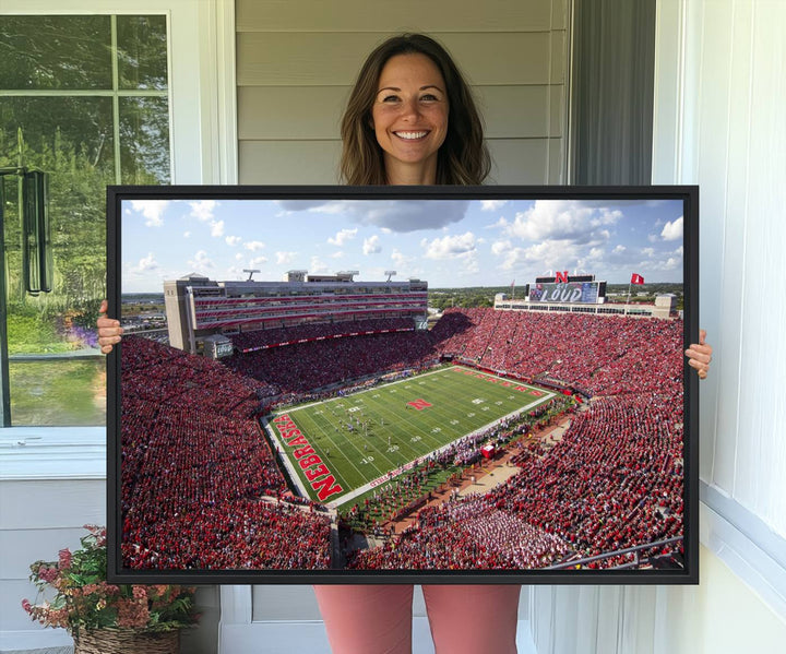 Wall art canvas print depicting a wide-angle view of Lincoln Memorial Stadium during a University of Nebraska game.