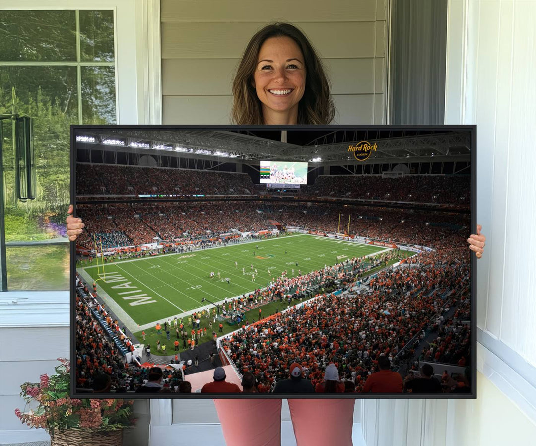 Aerial view of a Miami Hurricanes game at Hard Rock Stadium captured on canvas print, showcasing the teams on the field and fans in the stands.