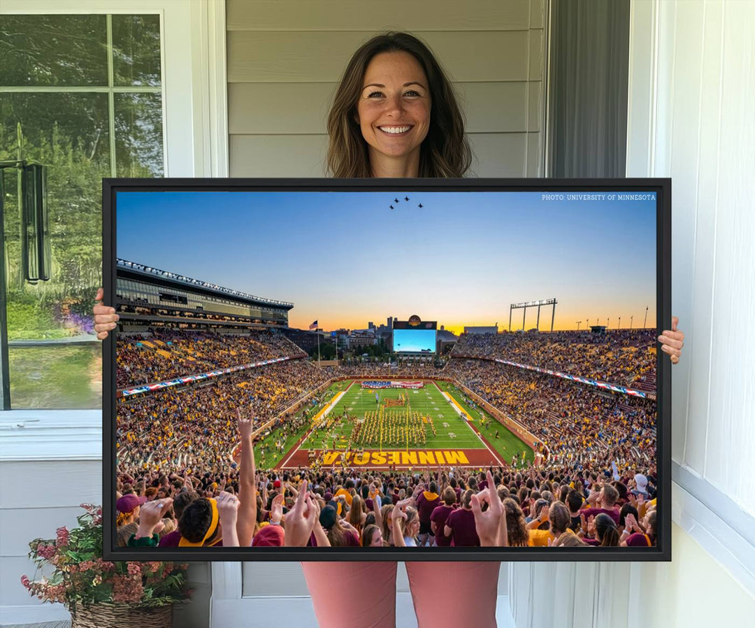 The University of Minnesota Golden Gophers Football Team Print, capturing a sunset scene, is ideal for gallery-quality wall art.