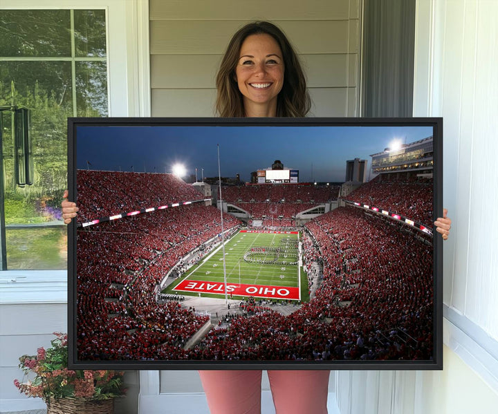 Premium gallery-quality canvas wall art featuring an aerial view of a packed Ohio State stadium at dusk, highlighting the Buckeyes.