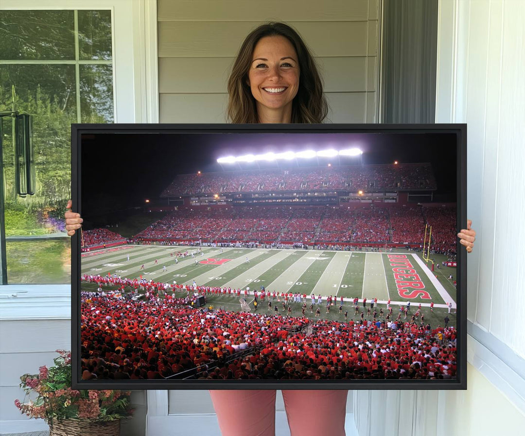 A bustling night game at SHI Stadium is captured as Rutgers Scarlet Knights wall art on a gallery-quality canvas print.