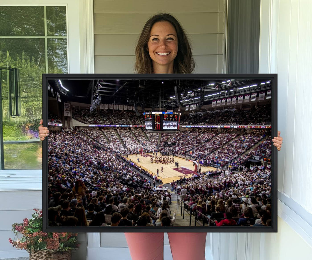 The Nebraska Basketball Arena Wall Art Canvas features an arena filled with Cornhuskers fans and players beneath a scoreboard.