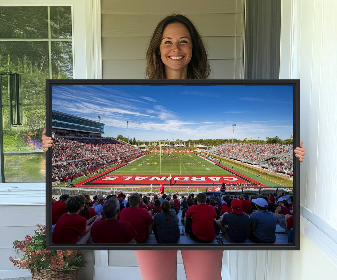 The Ball State Cardinals wall art on canvas depicts fans in red at Scheumann Stadium.