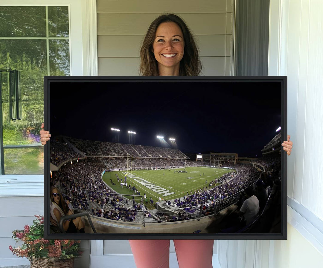 The wall art print features a night view of Amon G. Carter Stadium filled with TCU fans, showcased in the Horned Frogs Football Canvas Wall Art.