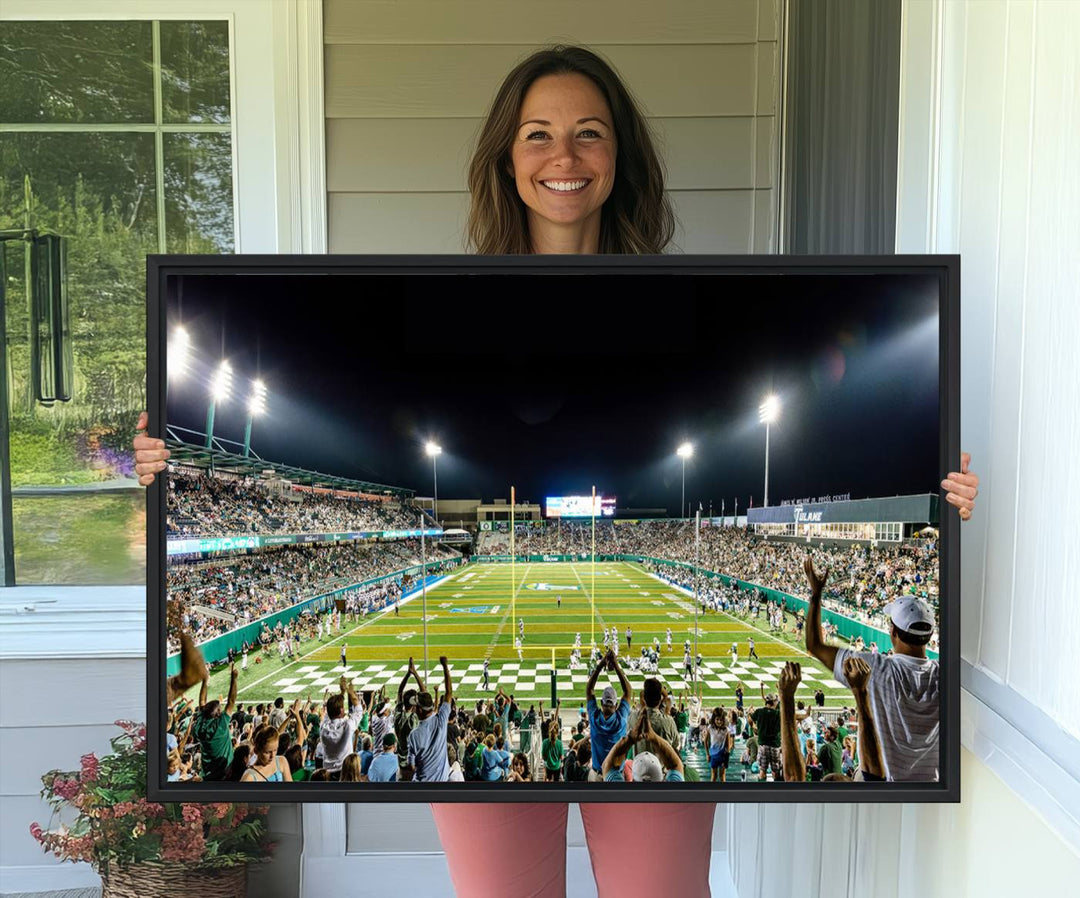 This vibrant wall art canvas print captures the excitement of fans cheering for the Tulane Green Wave Football Team under the lights of Yulman Stadium.