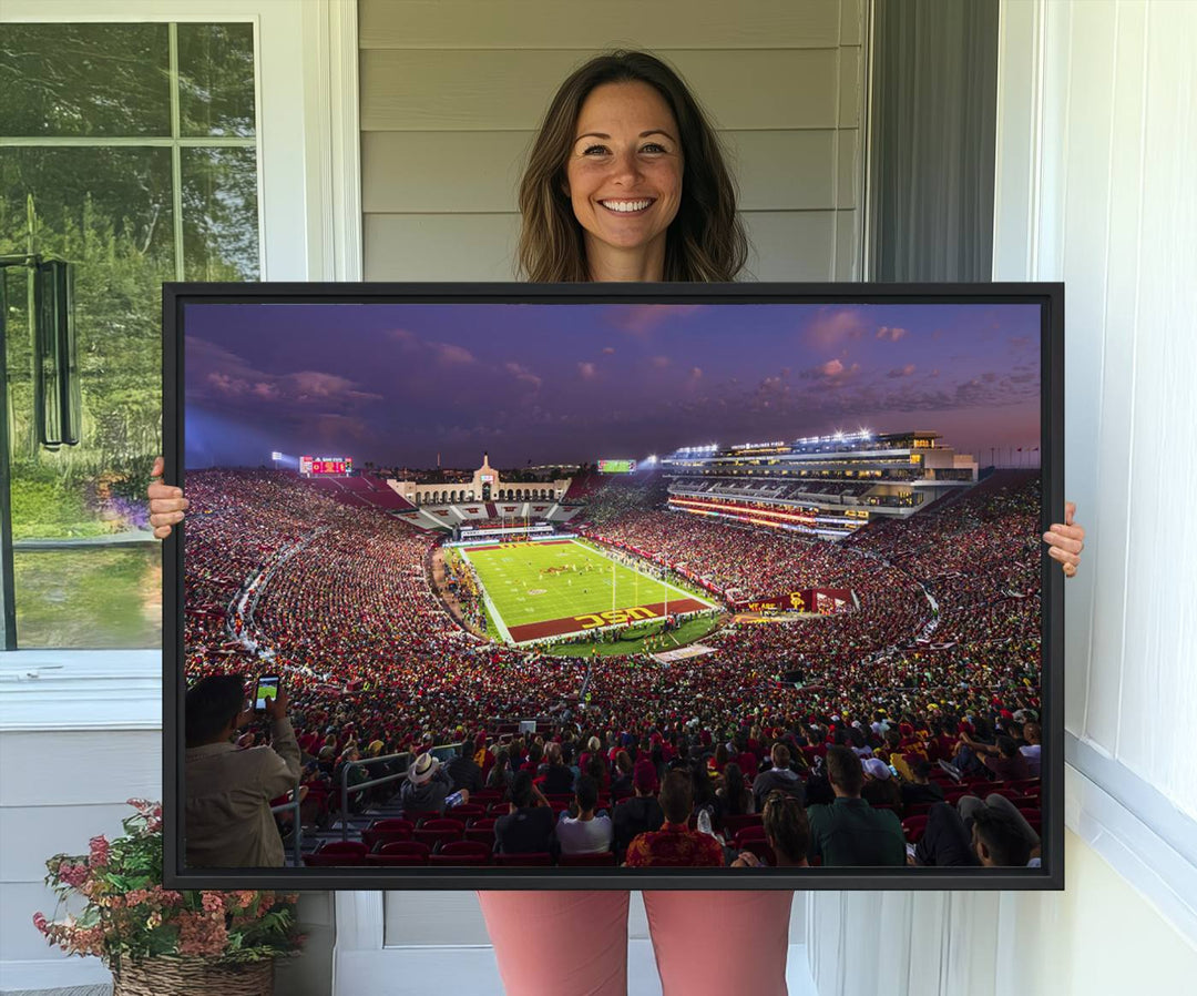 The vibrant wall art canvas print captures the USC Trojans playing under lights at dusk in LA Memorial Coliseum.