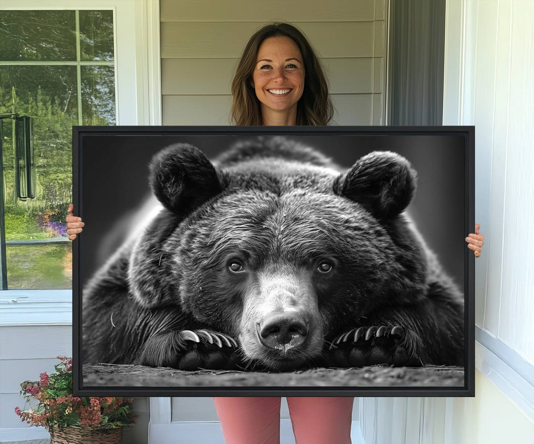 A black and white canvas print titled Resting Grizzly 399 Bear is displayed prominently.