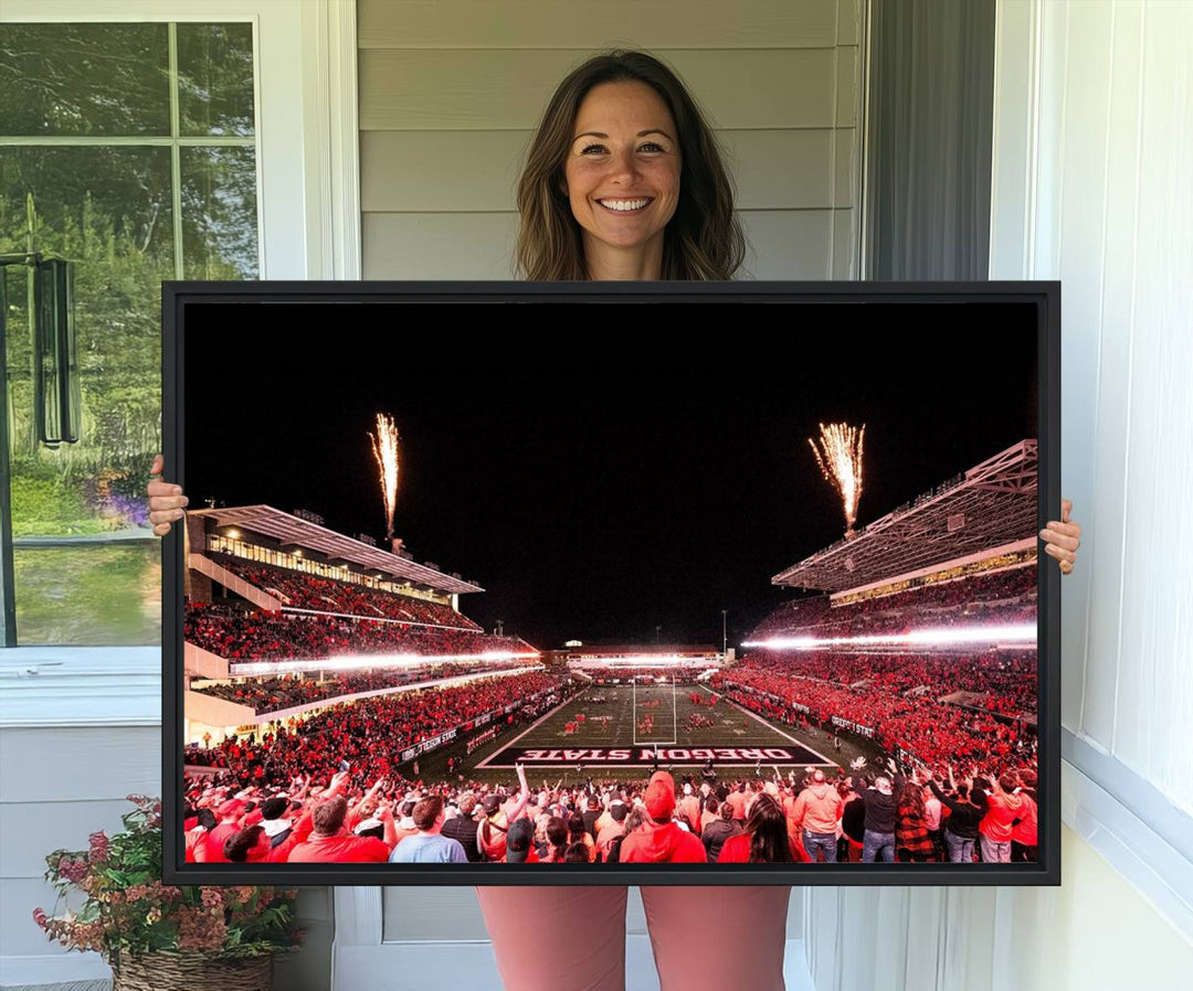 At Corvallis Reser Stadium, vibrant wall art captures the spirit of Oregon State Beavers football against a backdrop of a fireworks-lit night sky.