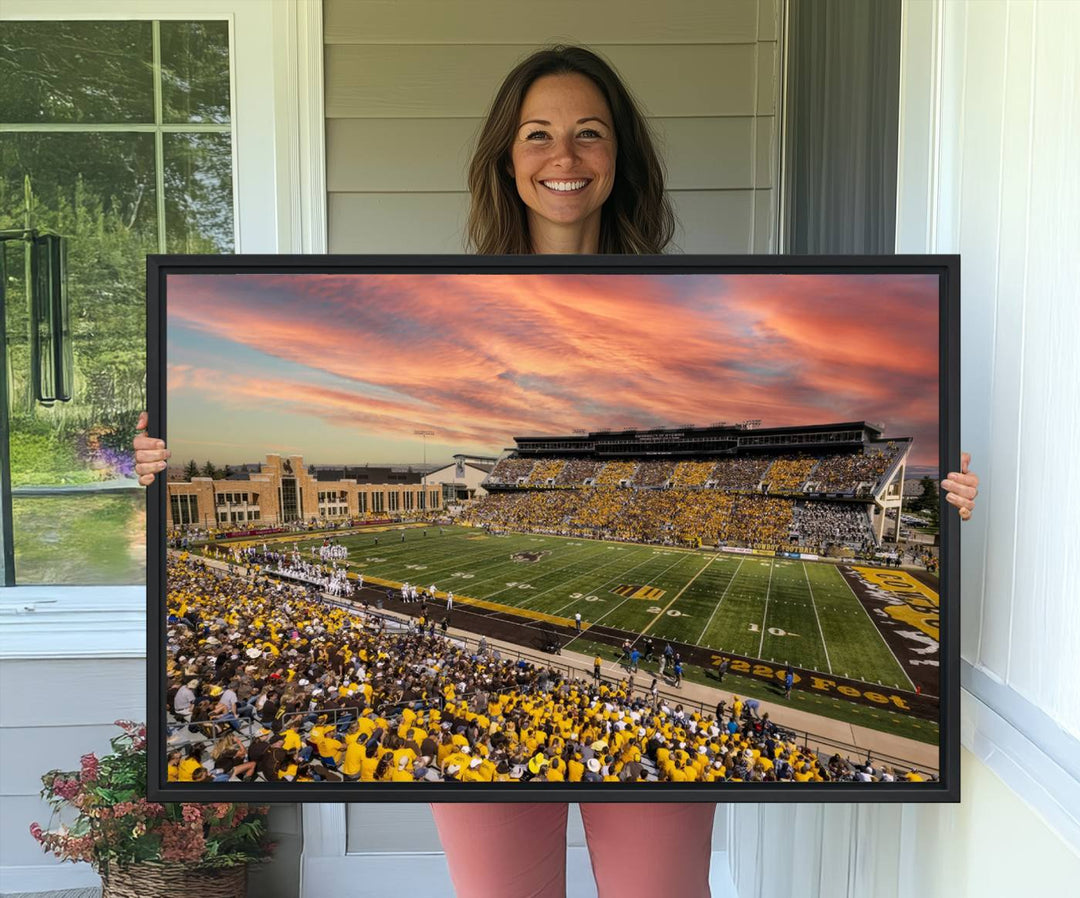 Capture the essence of a packed War Memorial Stadium at sunset with the Cowboys Football Canvas Print, highlighting fans cheering in yellow.