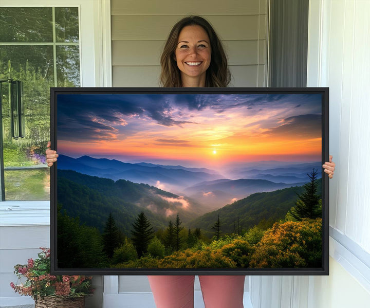 The Majestic Mountain Sunrise Print features a vibrant sky, layered hills, and evergreens, making it a stunning piece of wall decor.