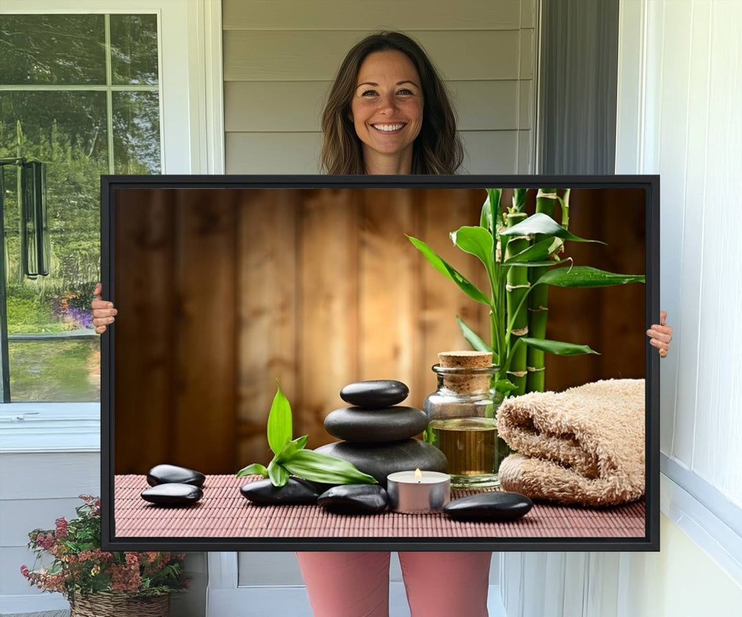 Zen Serenity Triptych Canvas Art: Pink Lotus Flower and Stones, Tranquil Water Lily Print, creating a peaceful spa ambiance.