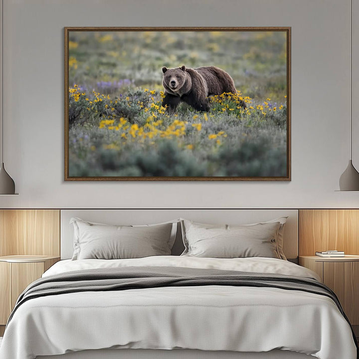 The "Grizzly 399 in Wild Flowers Wall Art Canvas Print" features a grizzly bear strolling through a field of yellow and purple flowers, beautifully showcased as a triptych. This handcrafted piece, proudly made in the USA, adds charm and sophistication to your space.