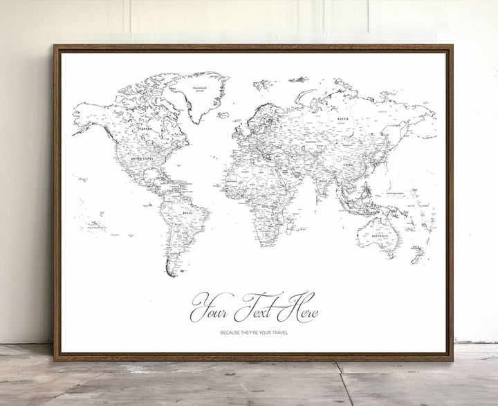 A large Framed Push Pin Mini World Travel Map Wall Art Print features customizable text and is designed as a premium cork pin board canvas with labeled countries for a gallery-quality finish.