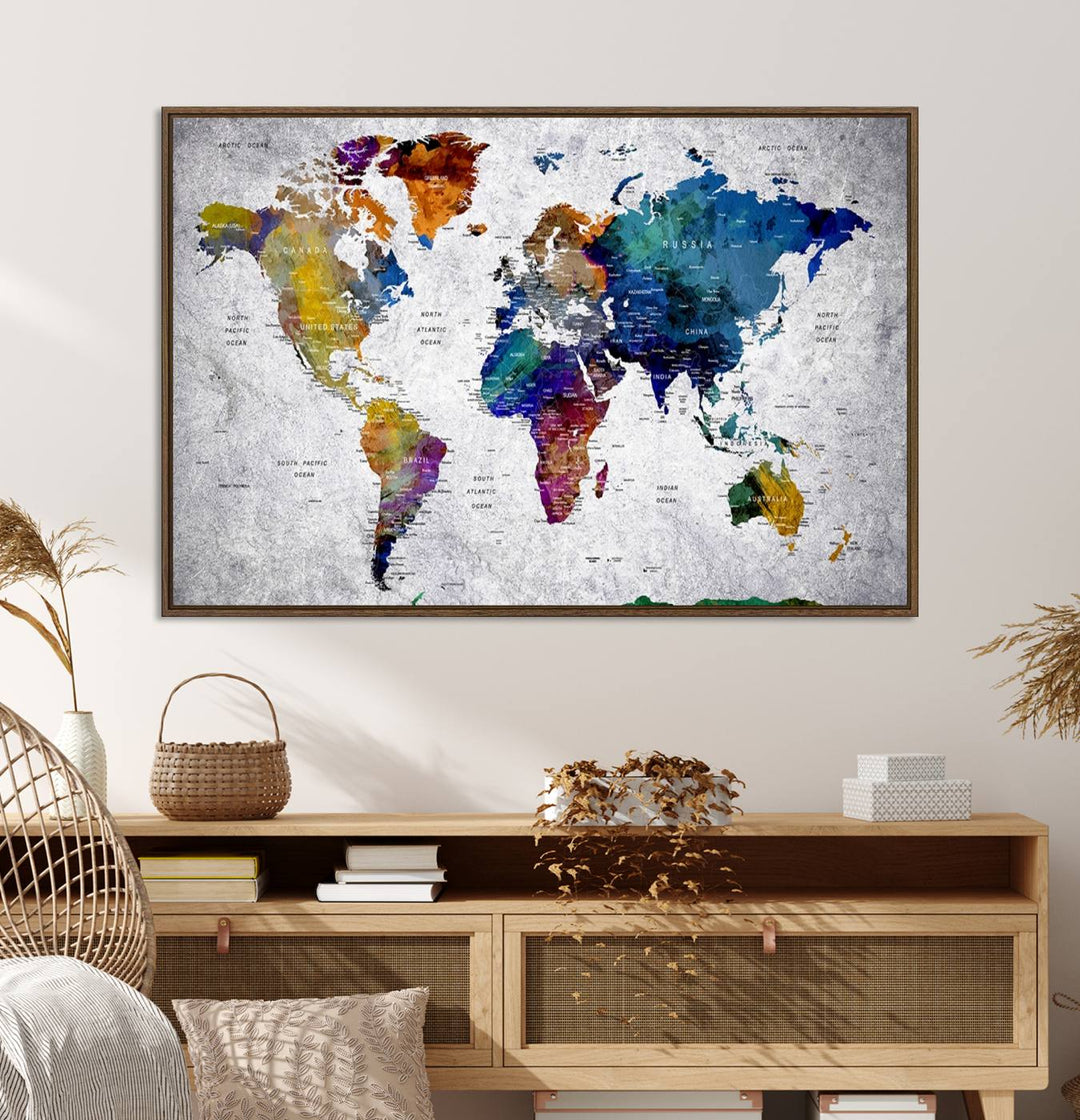 The World Map Art Canvas Print, featuring country names on a grunge-stained gray background, is perfect for stylish home decor.