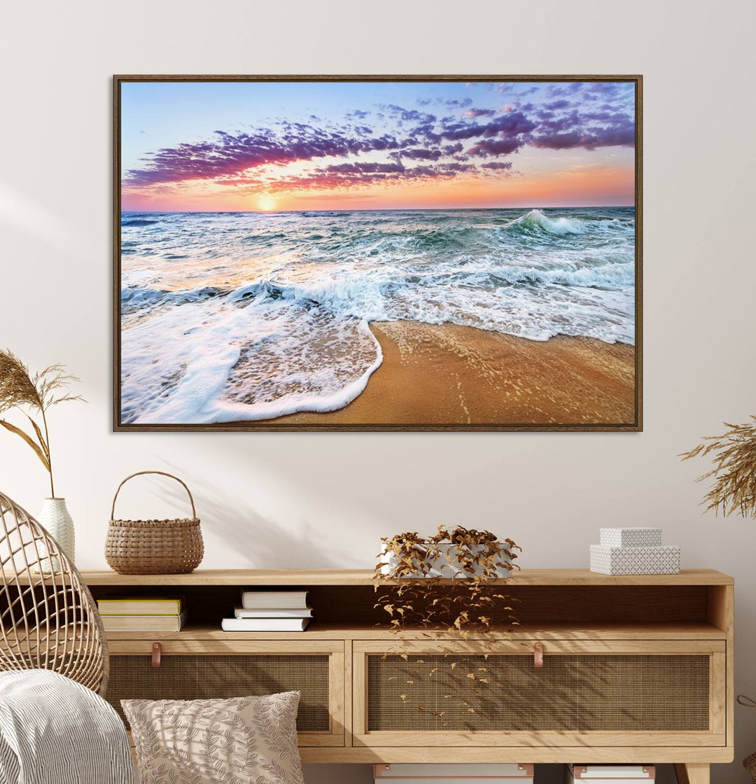 The Coastal Sunset Art Canvas Print features ocean waves beneath a vibrant sky in a stunning 3-panel seascape.