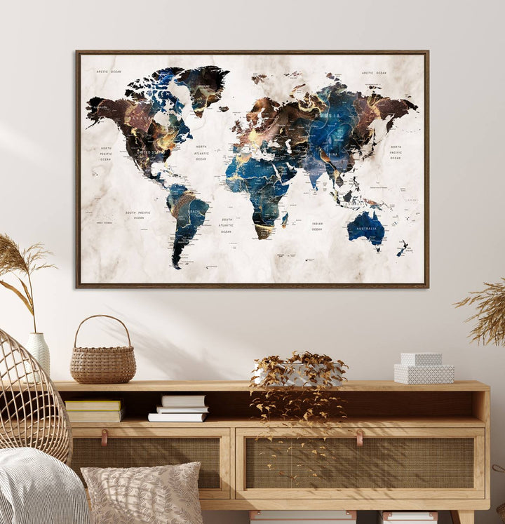 Abstract earth-toned 3-panel world map wall art featuring blues and browns, ready to hang; it showcases continents on modern canvas.