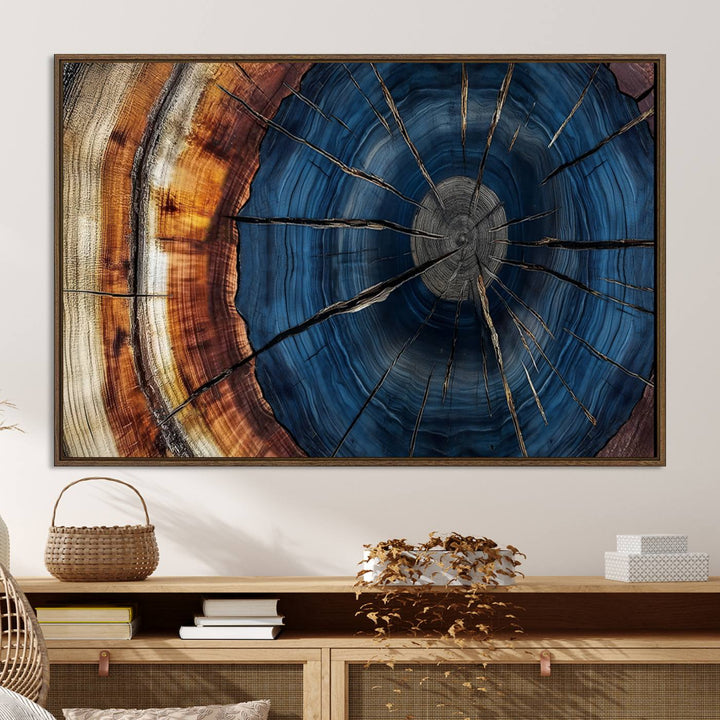 The Abstract Tree Rings Canvas Print features blue, brown, and orange rings that highlight wood grain and natures beauty.