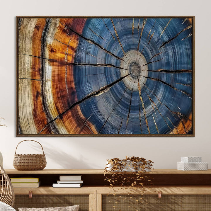 Close-up of blue, brown, and orange wood grain rings on the Abstract Tree Rings Canvas Wall Art Print.