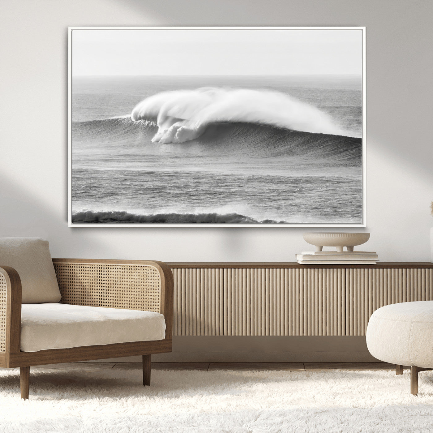 A dramatic black and white ocean wave crashing with immense force, capturing the raw power and movement of the sea in a bold seascape.