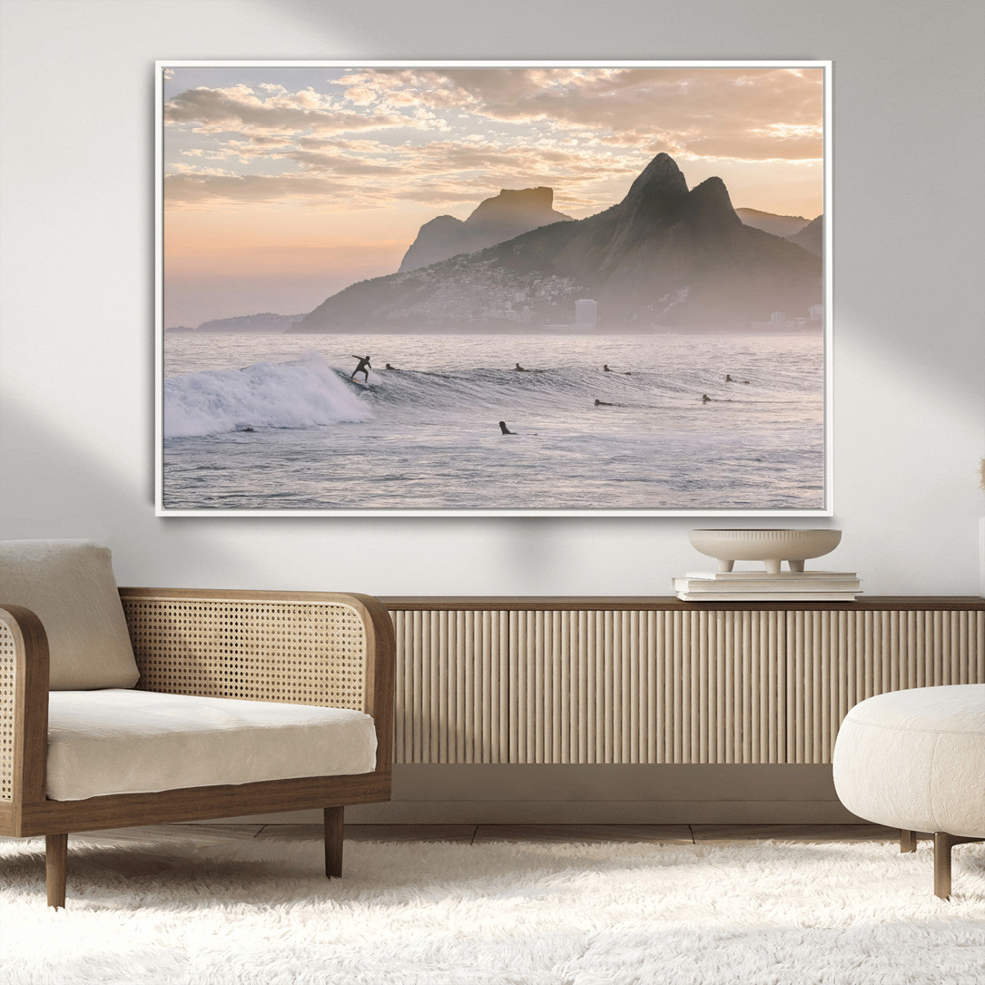A surfer rides a golden hour wave near misty coastal mountains, surrounded by fellow surfers, capturing the spirit of a coastal adventure.