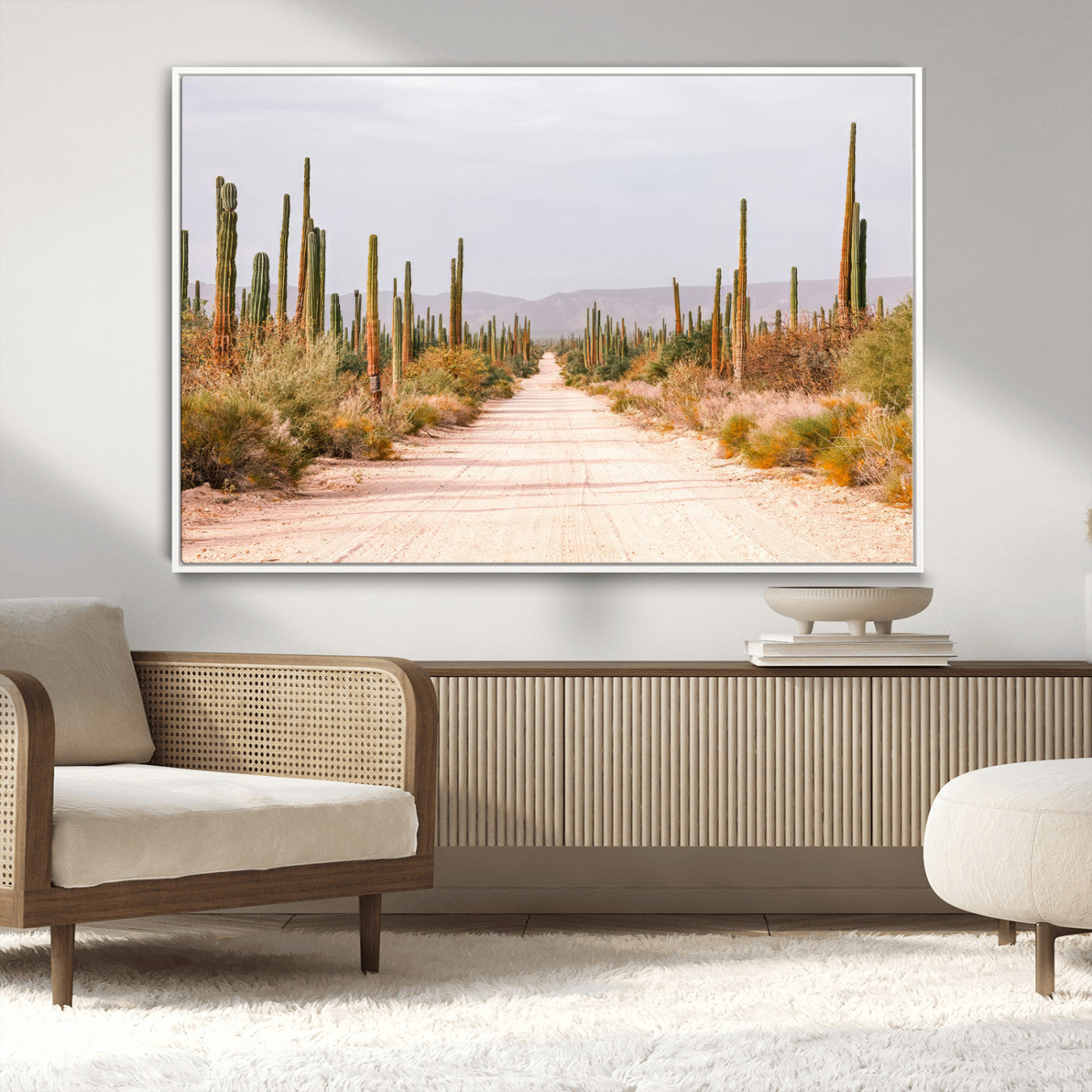 A desert road lined with saguaro cacti under a golden sky, creating a warm southwestern feel, perfect for boho or rustic decor.