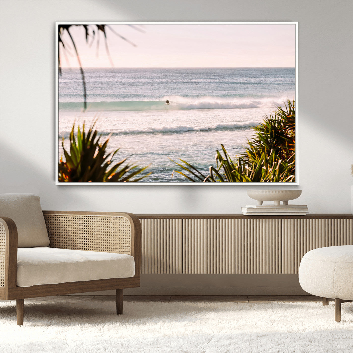Canvas of a lone surfer riding a pastel wave at sunrise, perfect for tropical or coastal-themed spaces with a relaxed, airy vibe.
