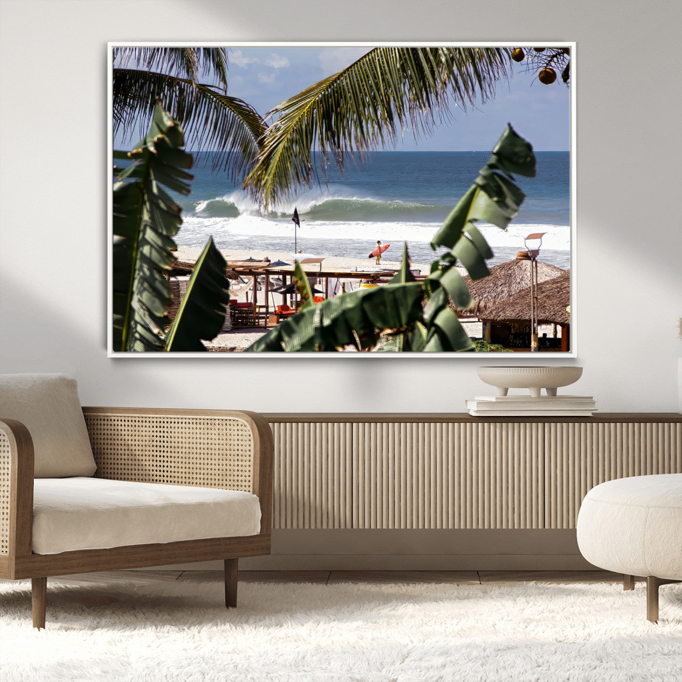 Canvas wall art of a tropical surf scene framed by palm trees, with a surfer on the shore and waves rolling in, ideal for beach-themed decor.