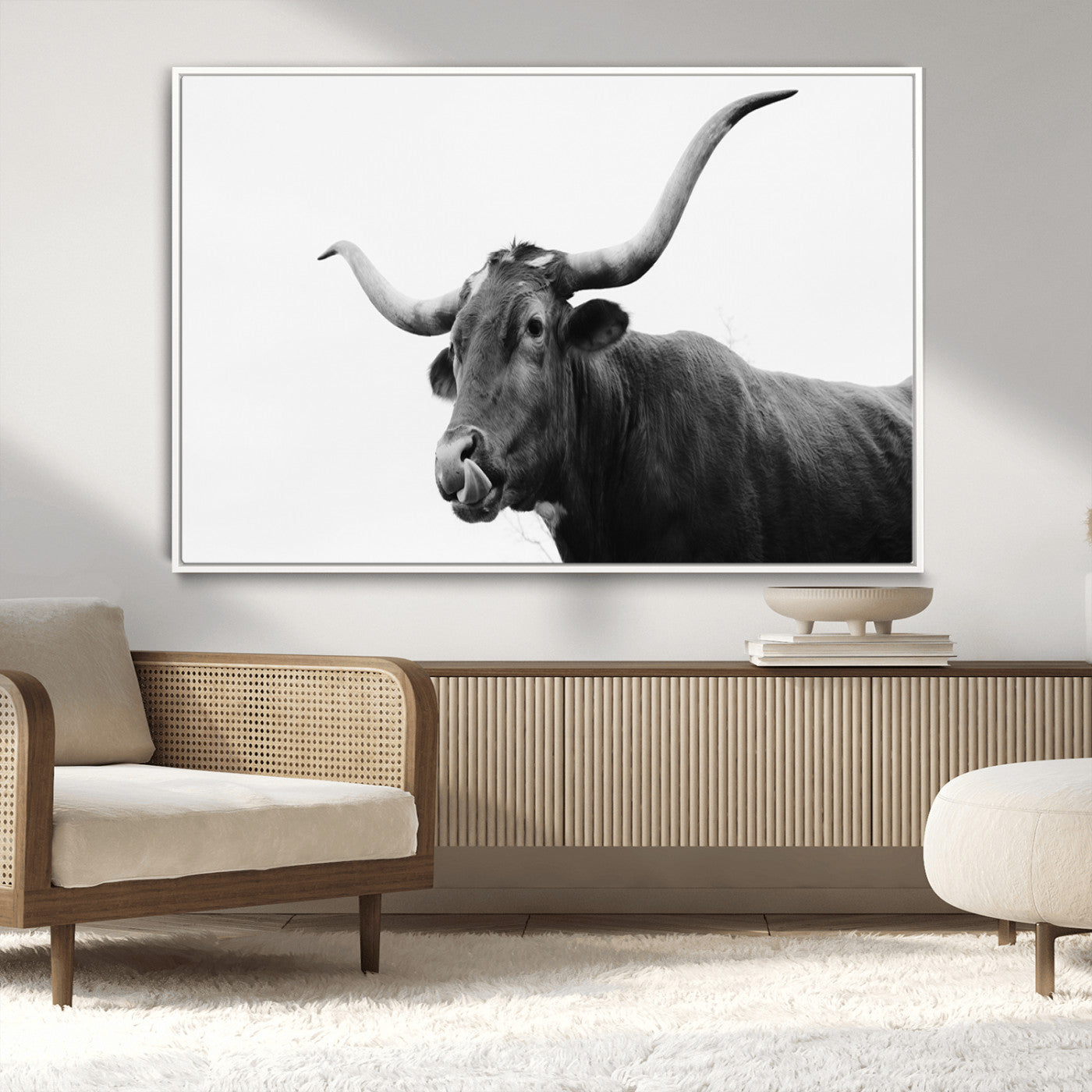 Black and white photo of a Texas Longhorn cow with curved horns, ideal for rustic, western or minimalist style home decor.