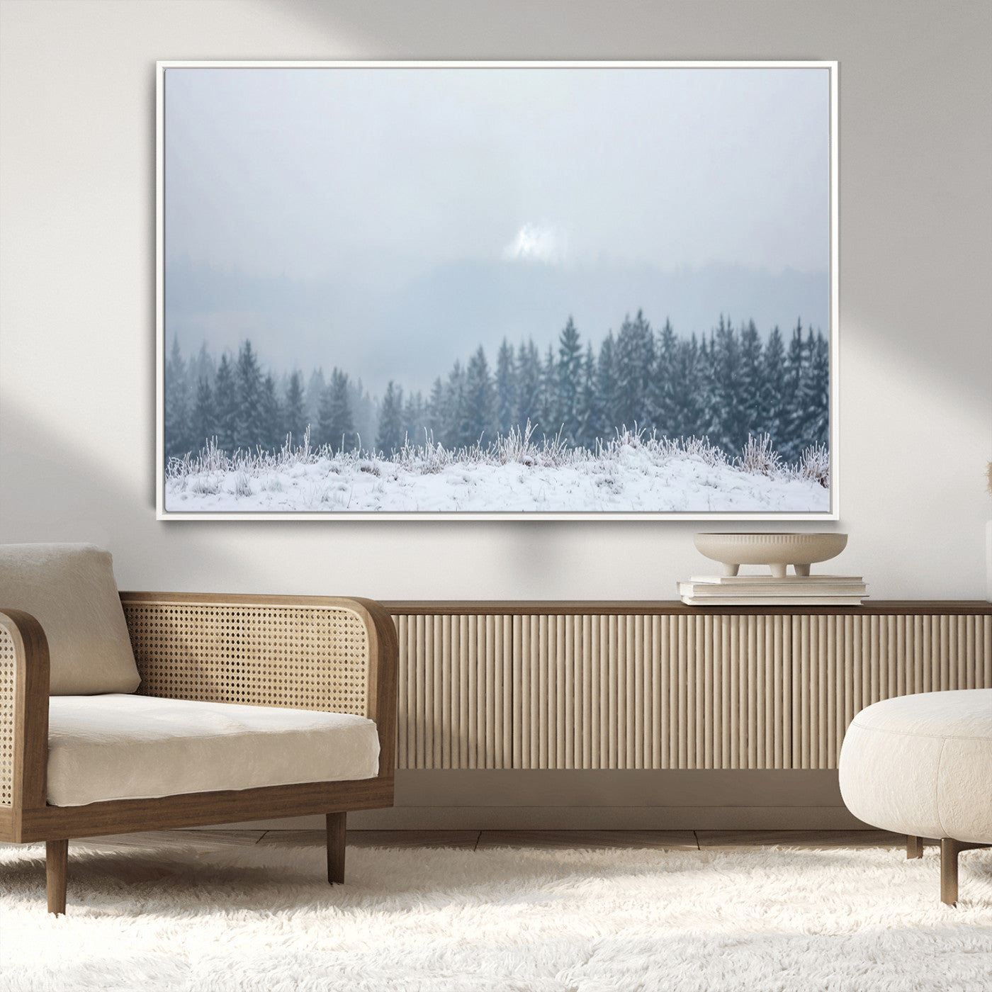 Snow-covered forest under misty sky, soft light breaking through clouds, ideal for minimalist or Nordic-inspired home decor.