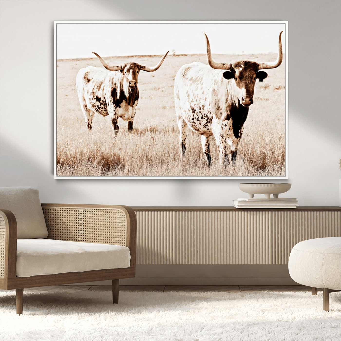 Two Texas longhorn cows standing in a sepia-toned pasture, evoking rustic charm perfect for farmhouse or western country interiors. (