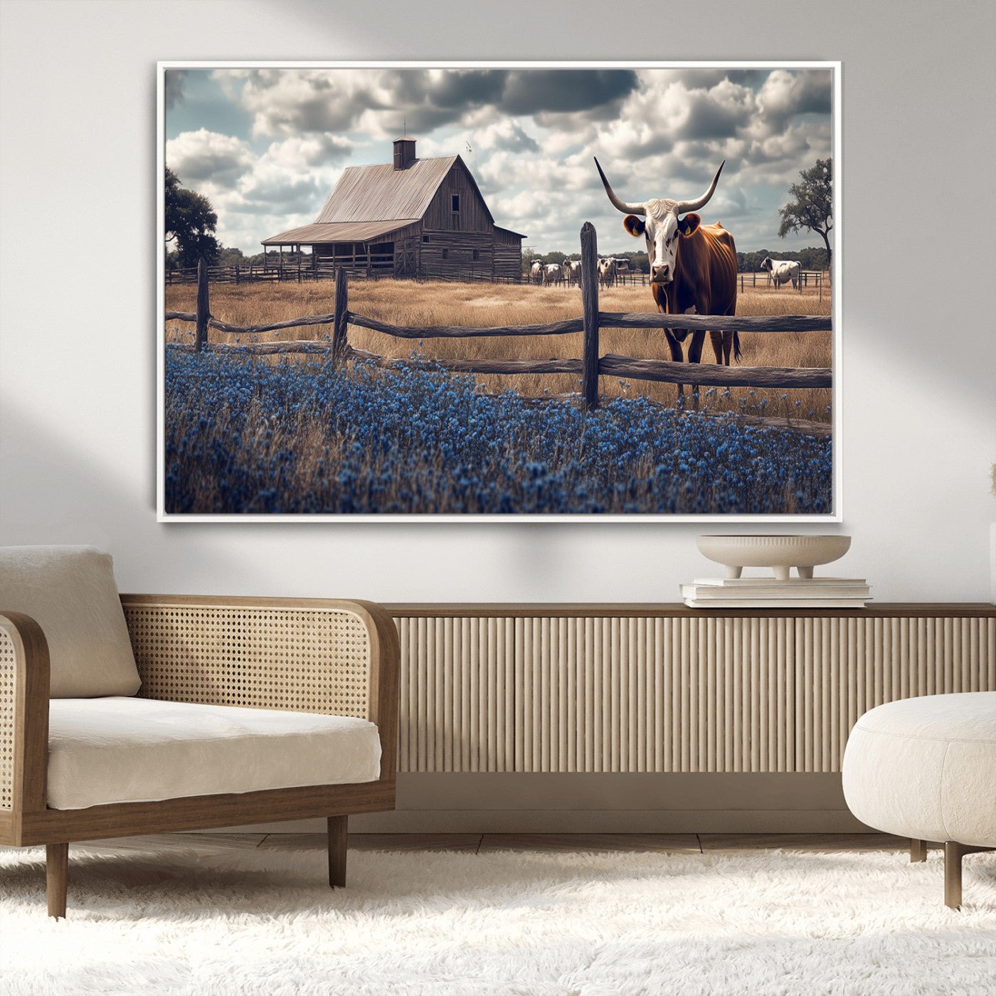 Framed canvas art of a Texas Longhorn cow near a rustic barn and bluebonnet field, ideal for country-style or farmhouse wall decor.