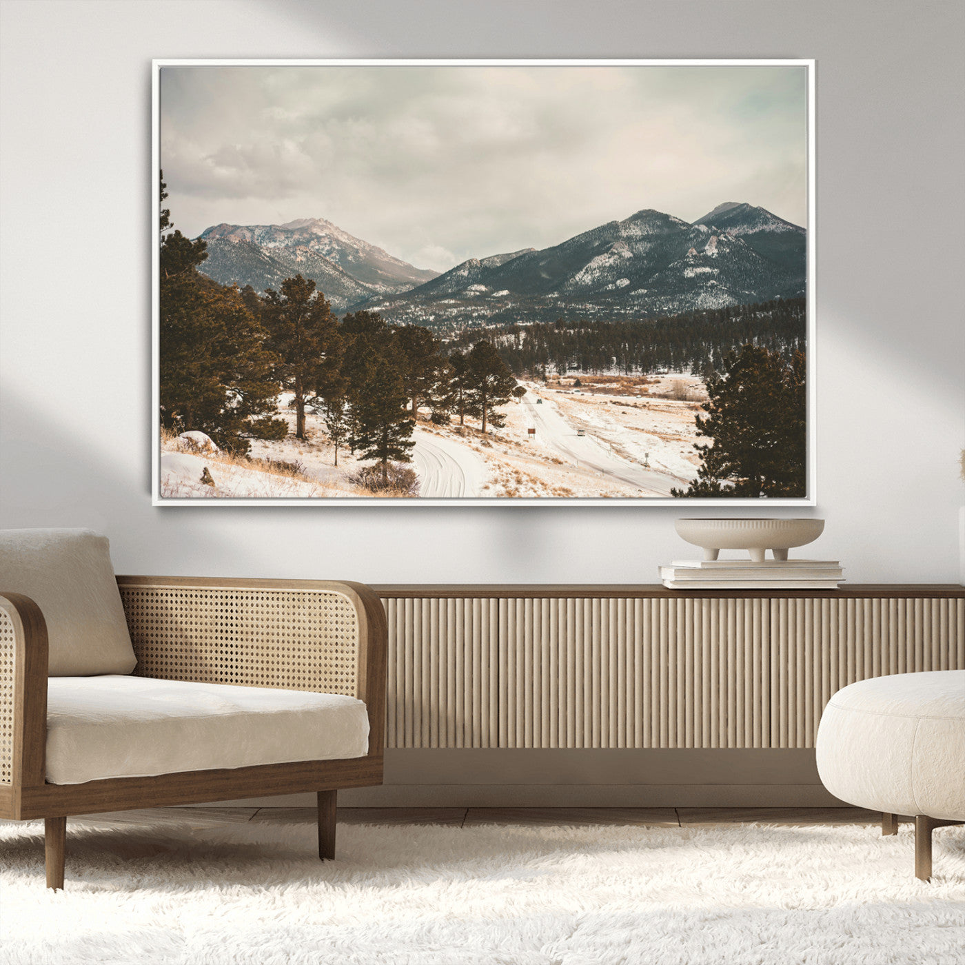 Snow-covered mountains with pine trees and a winding path, creating a serene and rustic winter landscape perfect for cozy decor.