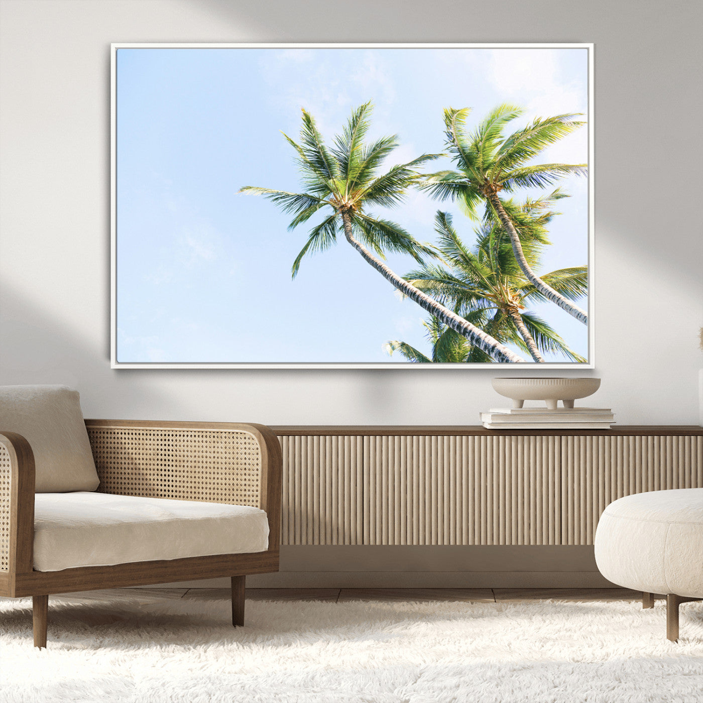 Tall palm trees swaying under a bright blue sky, capturing a tropical and minimalist beach vibe, perfect for coastal-inspired wall art.