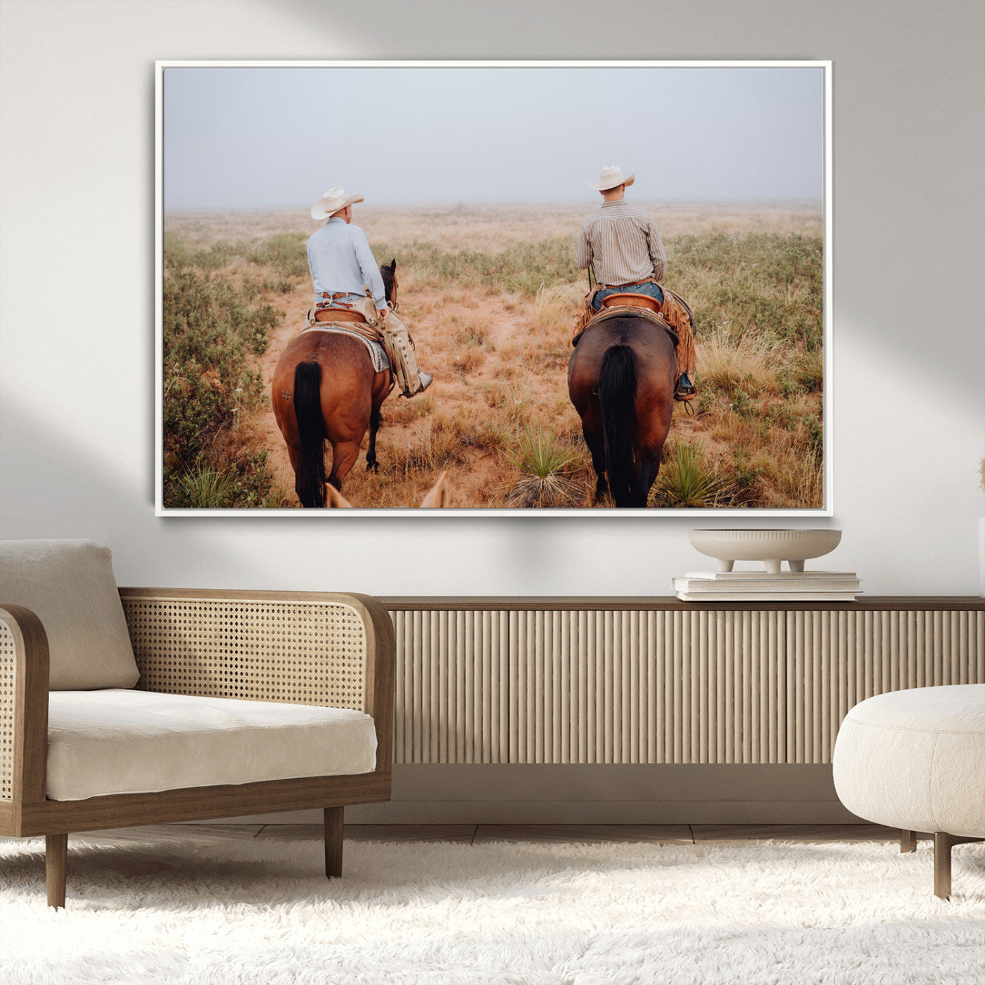 Two cowboys riding horseback through a misty prairie, capturing the rustic and adventurous spirit of the Western frontier.