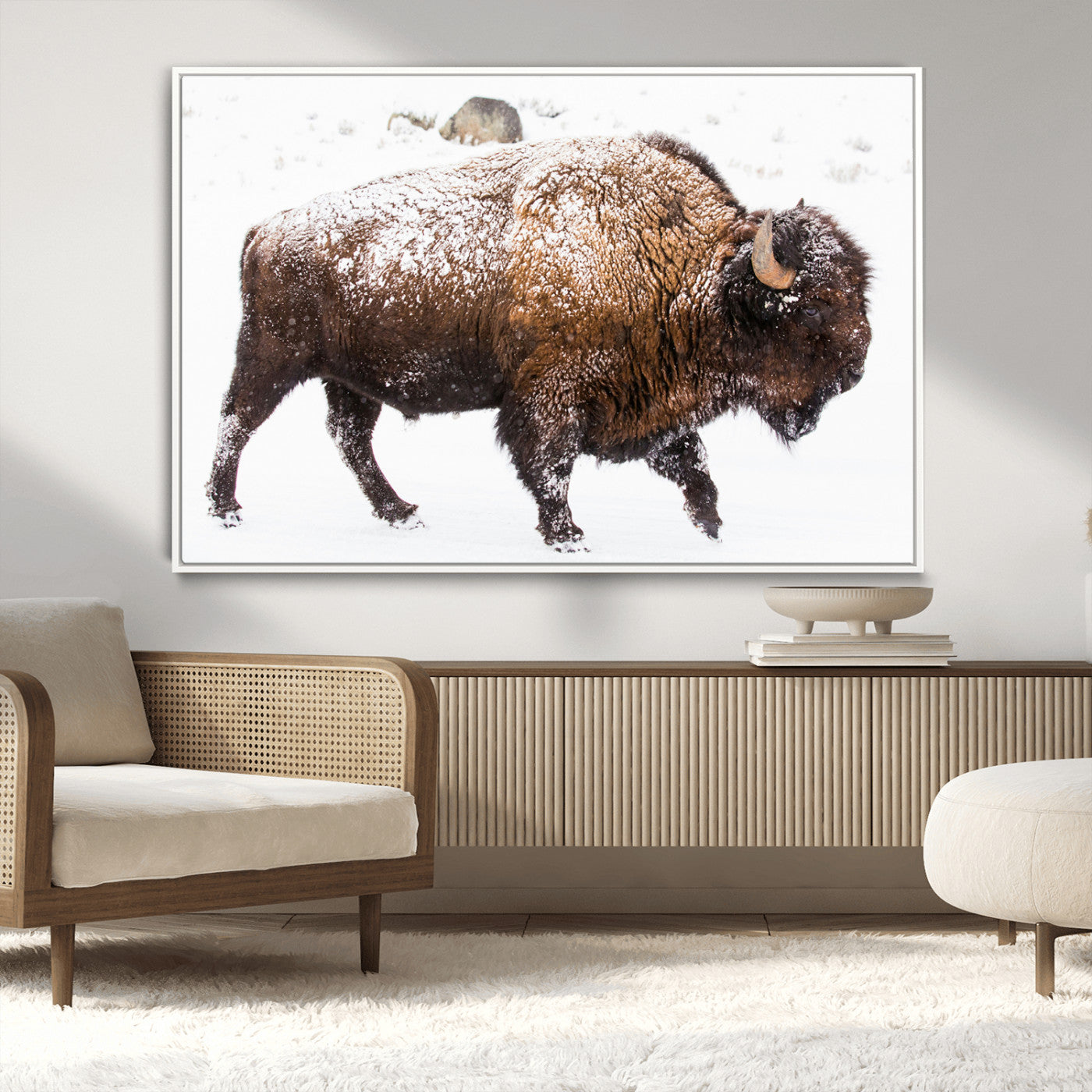 Side profile of a powerful bison walking through deep snow, with frost-covered fur and a white winter background, perfect for rustic and western decor.
