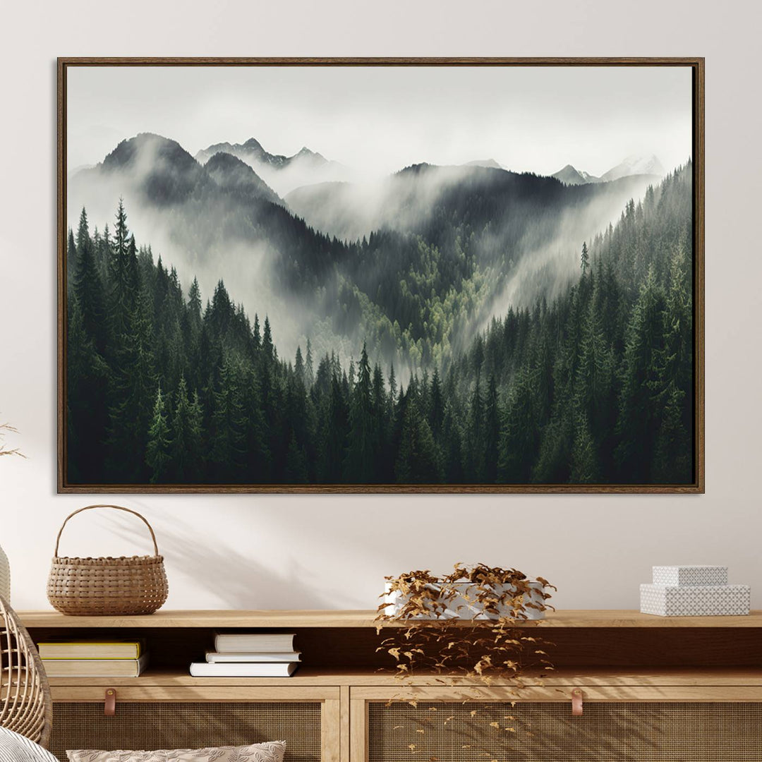 The Misty Forest Canvas Print Wall Art captures a serene misty forest scene with fog and mountains.