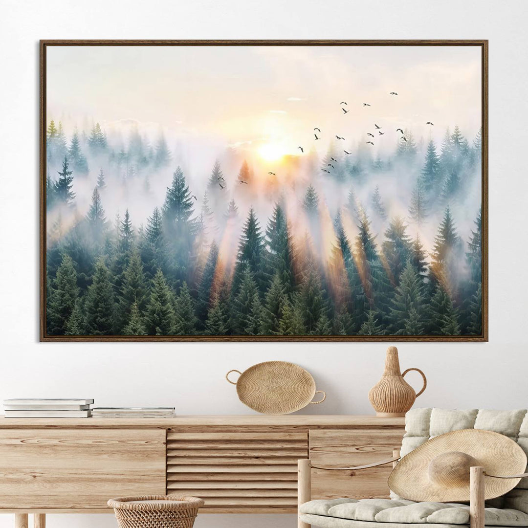 Misty Pine Forest Wall Art: A depiction of sunrise over foggy trees and birds against a bright sky; a framed woodland scene ideal for home or office decor.